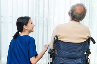 asian-nurse-take-care-of-senior-man-on-wheelchair-2021-12-09-11-13-46-utc.jpg